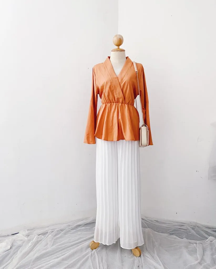 Bella Peplum Top