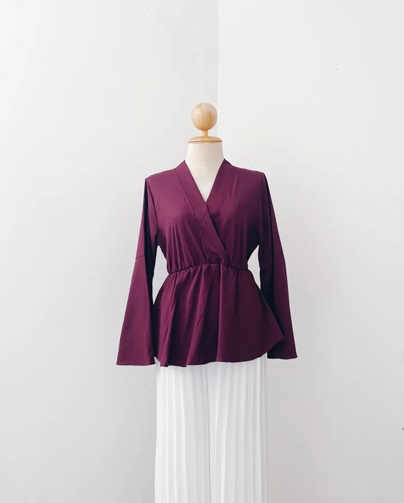Bella Peplum Top
