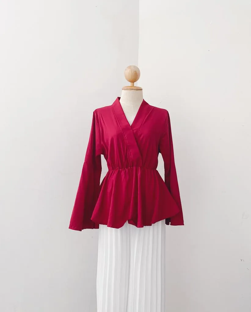 Bella Peplum Top