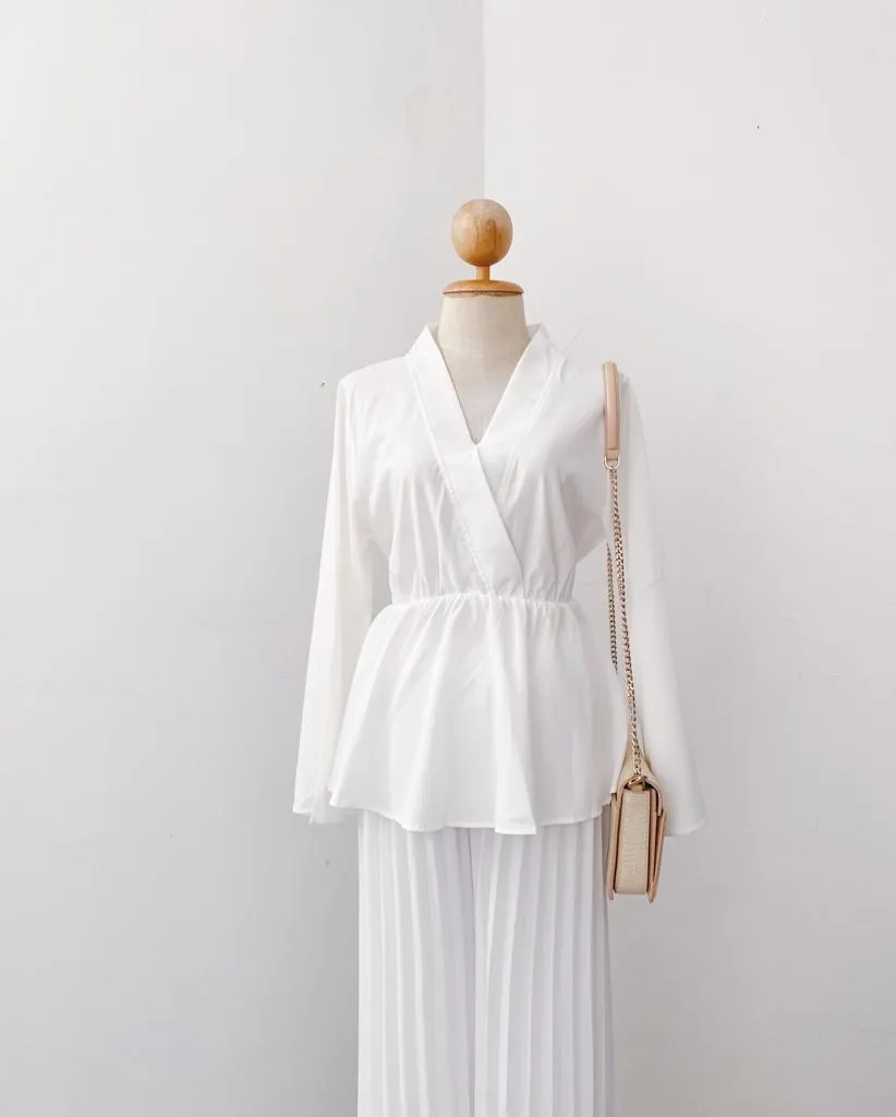 Bella Peplum Top