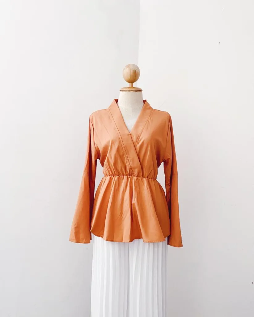 Bella Peplum Top