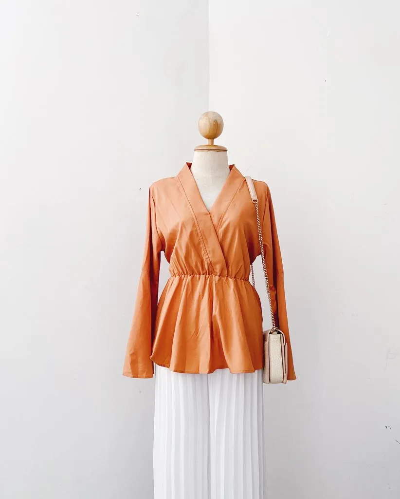 Bella Peplum Top