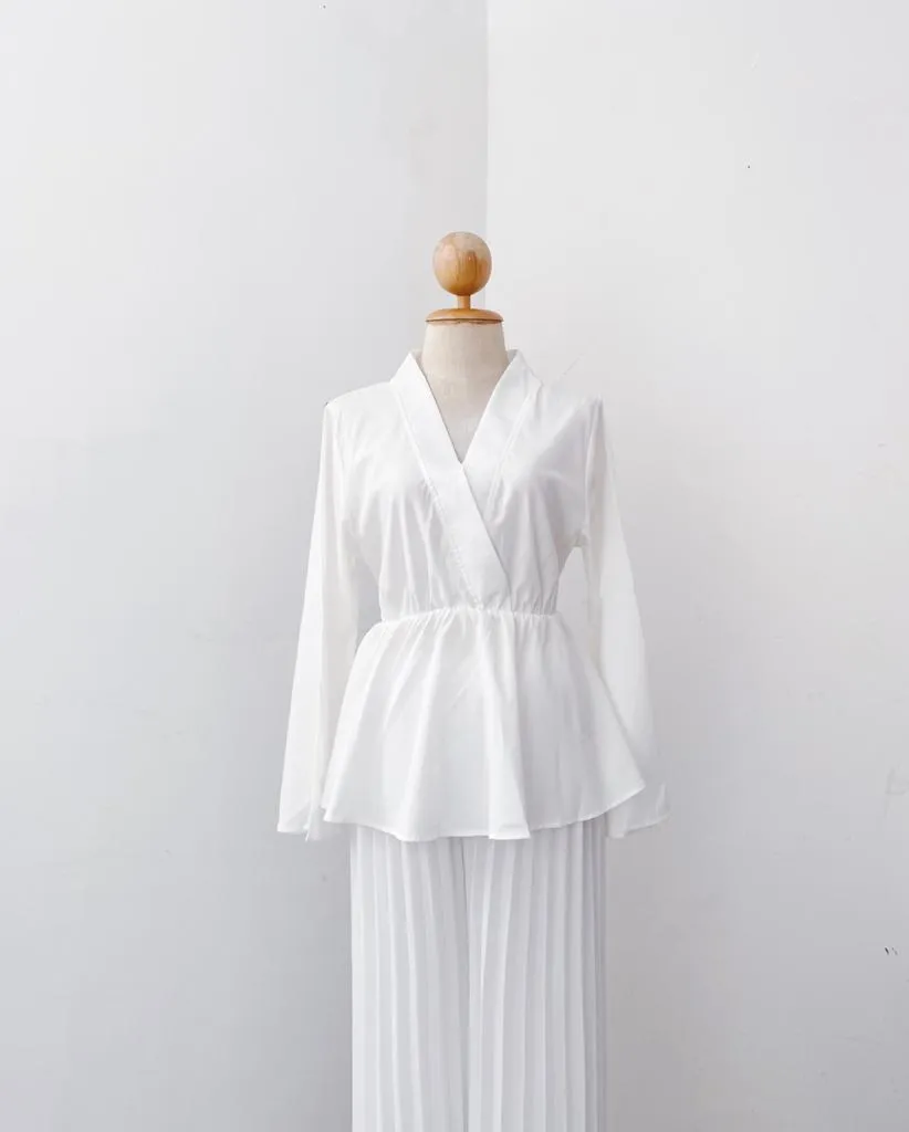 Bella Peplum Top