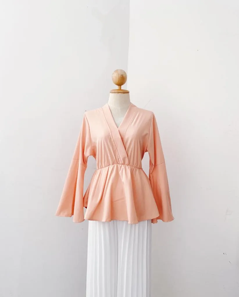 Bella Peplum Top
