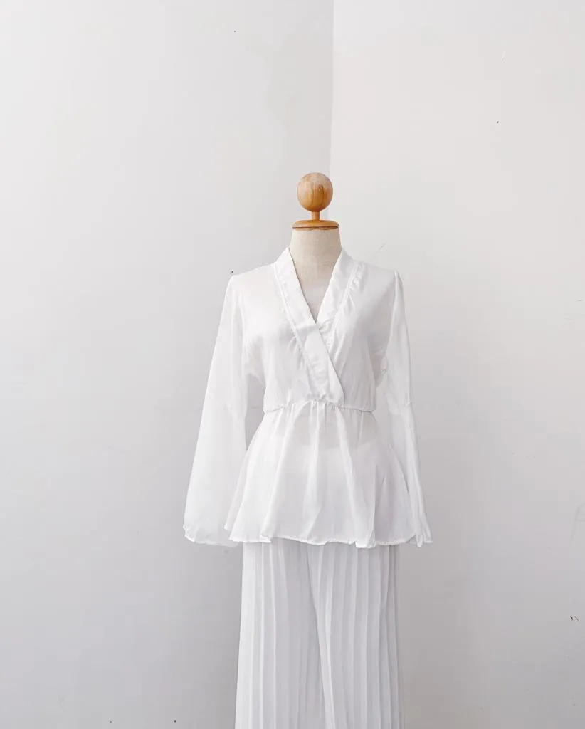 Bella Peplum Top